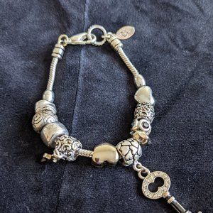 Silver Tone High End Charm Bracelet Mark CG